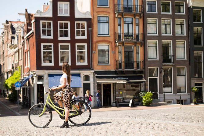Anne Frank Private Bike Tour in Amsterdam - Spinoza Monument and the value of short, well-timed pauses