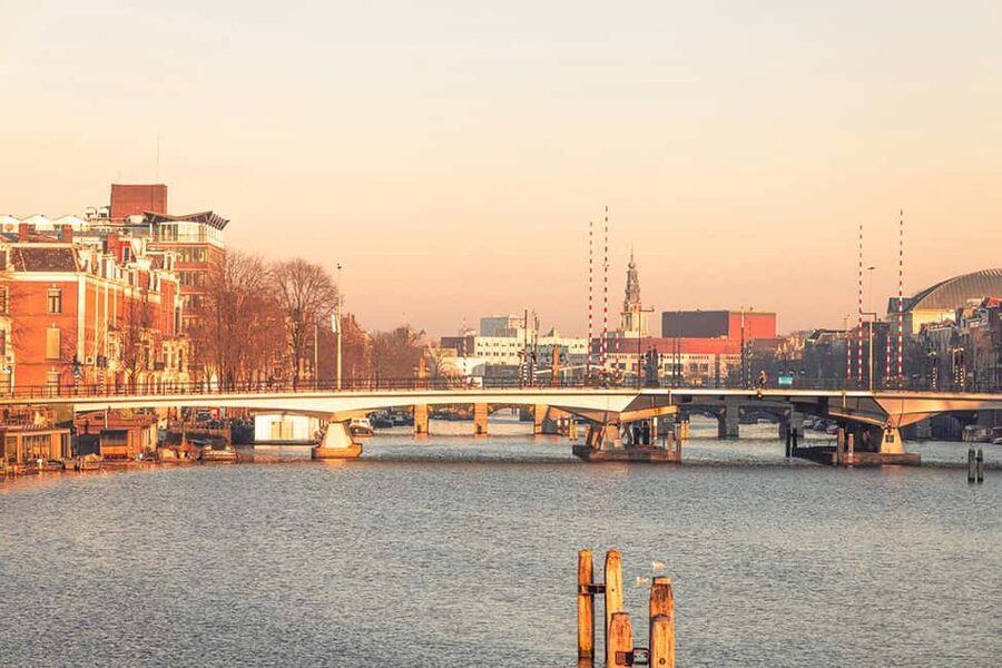 Capture Iconic Amsterdam: Photo Walk with a Pro Photographer - Begijnhof and Spui Square: calm texture, careful framing, and real-world constraints