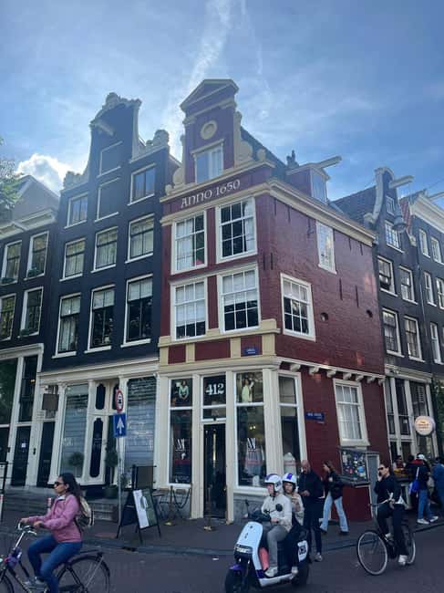 Capture Iconic Amsterdam: Photo Walk with a Pro Photographer - Two bridge viewpoints: Aluminiumbrug and Staalmeestersbrug with the Zuiderkerk tower