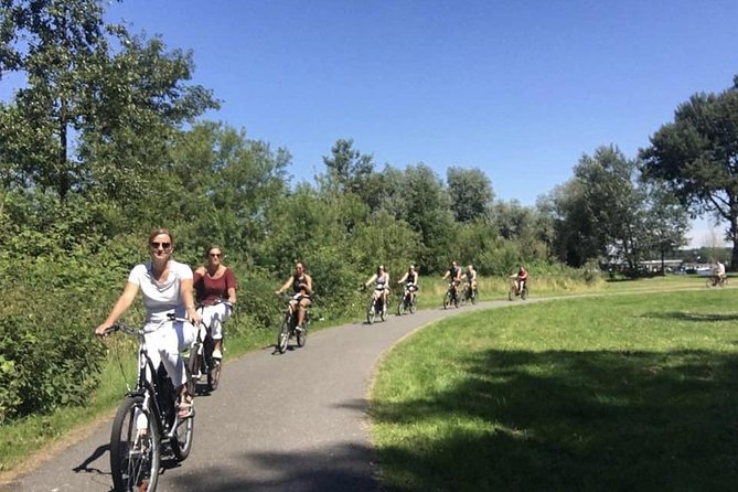 Cheese, Canals & Windmill Countryside E-Bike Tour Amsterdam - Amsterdam Centraal to the IJ: The Ferry Start That Sets the Tone