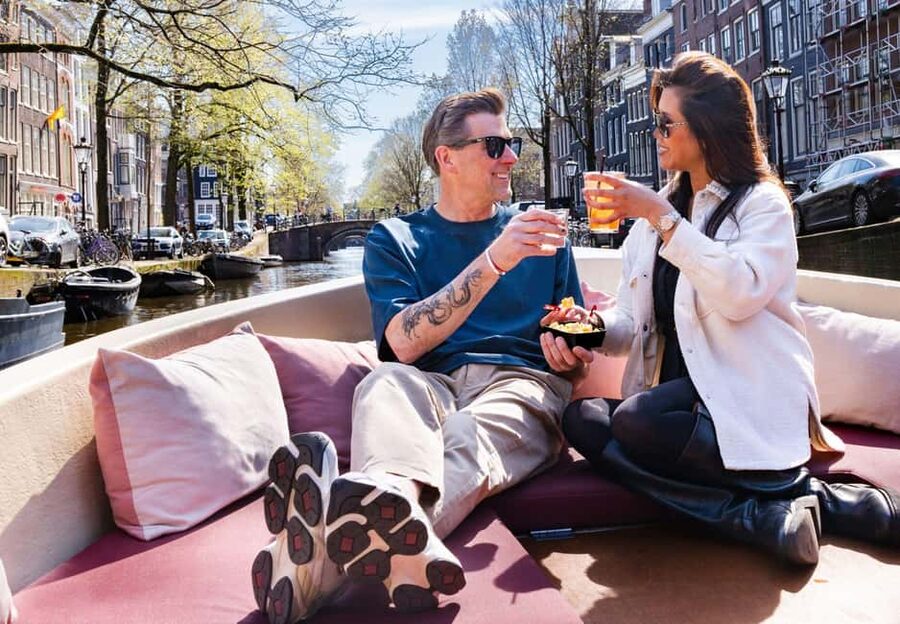 Cheese & Drinks Guided Amsterdam Boat Tour, All Inclusive - Meeting at Oudezijds Voorburgwal, then slipping into Amsterdam by water