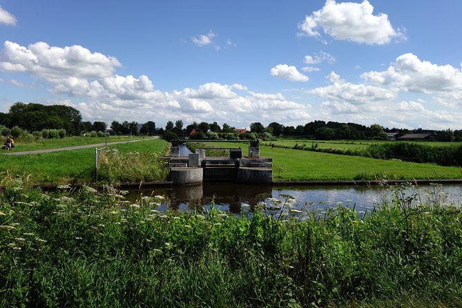 Countryside Bike Tour from Amsterdam: Cheese, Clogs & a Windmill - From Amsterdam Central to Quiet Polders in One Ride