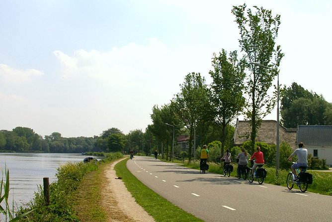 Countryside Bike Tour from Amsterdam: Cheese, Clogs & a Windmill - Broek in Waterland: Wooden Houses and Still Canals