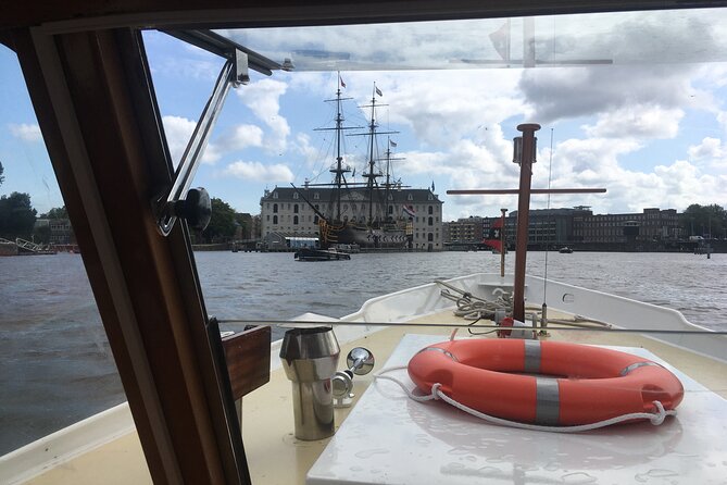 Cruise Amsterdam like a Local — Small Group 12 pax - Heated Boat Comfort, Open Bar, and the Real Value of Included Extras