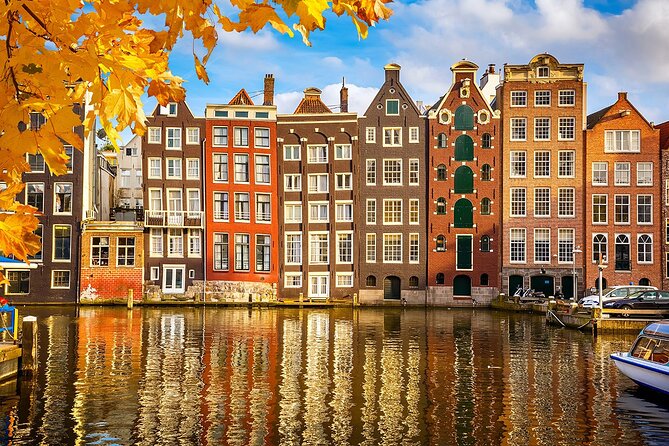 Customized Private Tour in Tesla to Zaandam, Windmills & Volendam - Cheese and wooden clogs: the practical way to get beyond the souvenir shelf