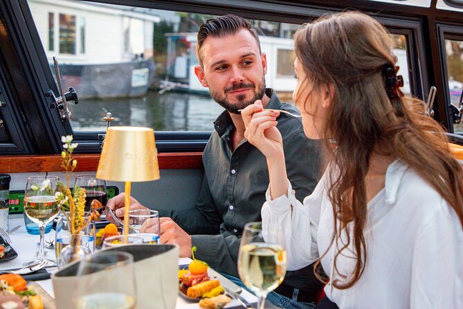 Dinner Canal Cruise Amsterdam: 4-Courses Including Drinks - Price and Value at About $106.93 Per Person