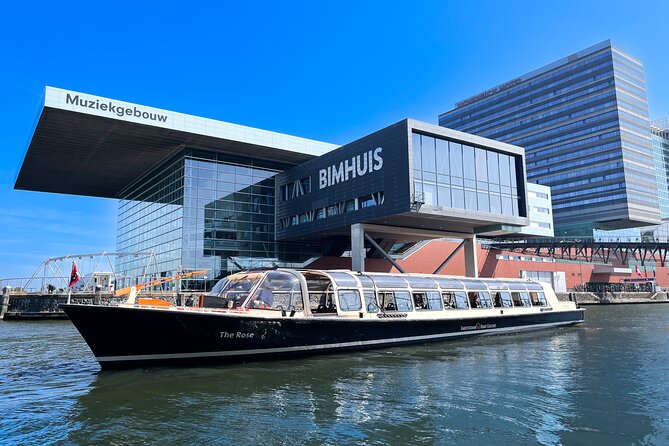 Discover Amsterdam: Luxury Canal Cruise with a Local Skipper - The boat and comfort: covered, heated, and built for real sightseeing