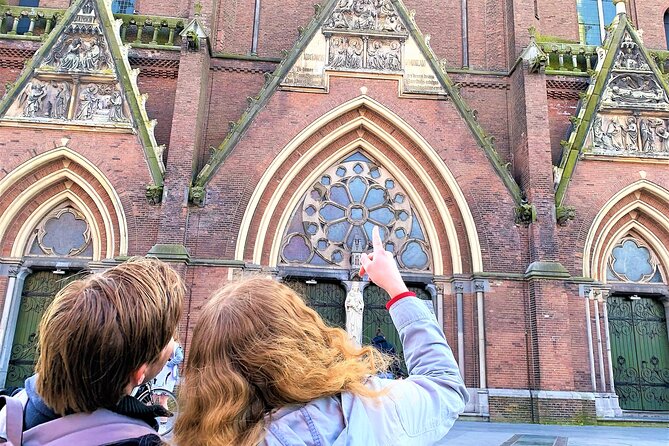 Discover Amsterdam's city center in this Outside Escape game tour - Stop-by-stop: Zuiderkerk to Staalstraat bridges and canal views