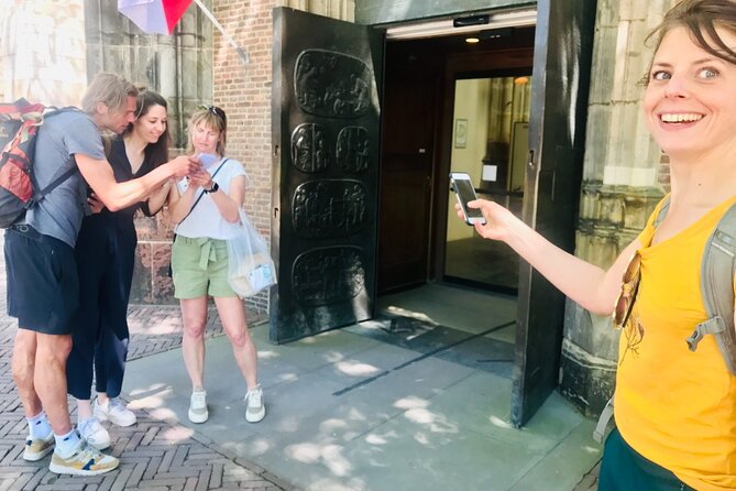 Discover Amsterdam's city center in this Outside Escape game tour - Nieuwezijds Voorburgwal canal houses to Dam Square’s city-heart payoff