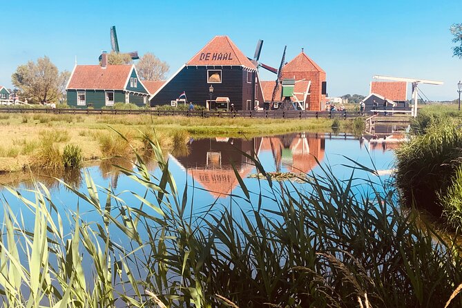 Dreamy Dutch Villages Tour: Giethoorn, Zaanse Schans & More - Zaanse Schans windmills, green wooden houses, and polders you can picture