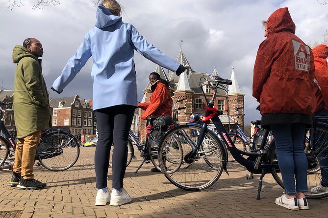 E-Bike Tour, Amsterdam's Highlights and Hidden Gems - Stop 1 in Prinseneiland: white drawbridges and old warehouses