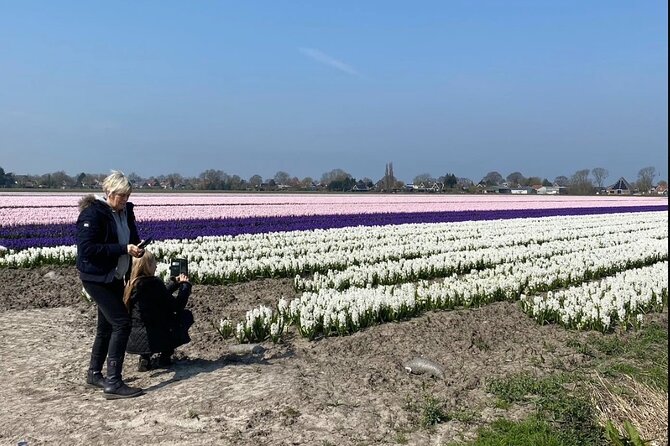 Early Flower fields with Lunch & Windmill Guided Day Tour - Onderdijk Lunch Stop and the Geradus Majella Church