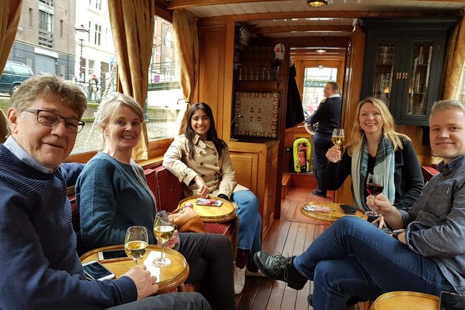 Eating Amsterdam: Food Tour & Canals Cruise - Stop 2 at Vishandel Centrum: herring and kibbeling, with fish prepped in view