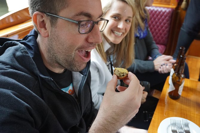 Eating Amsterdam: Food Tour & Canals Cruise - The Golden Age walk: architecture stories tied to food culture