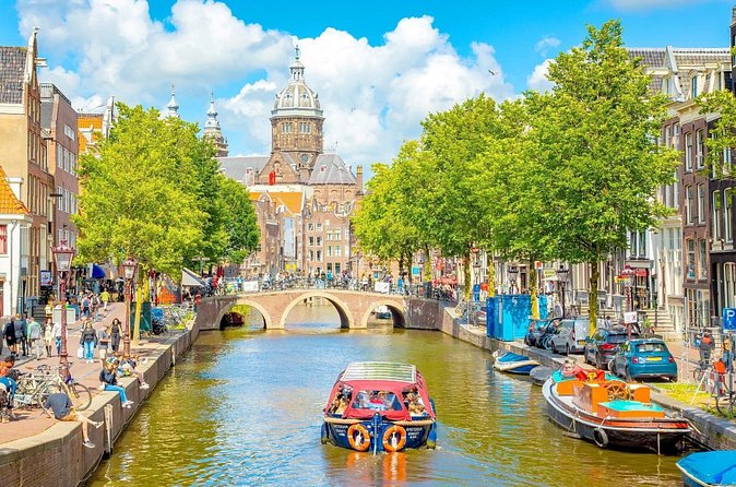 Essential Amsterdam Guided Walking Tour - Zeedijk and Nieuwmarkt: Old Streets, Shops, and the Waag Building