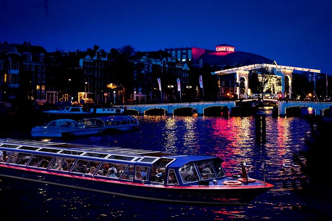 Evening Canal Cruise in Amsterdam with Wine & Cheese Option - Cruising the Amstel and the Magere Brug skinny bridge moment