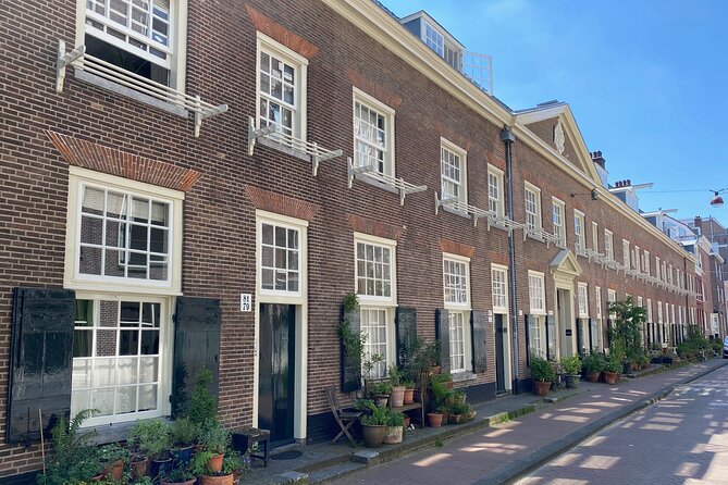 Explore hidden streets with friends - Private Tour - Beursplein Origins Walk: From Early Finance to the City’s Power Center
