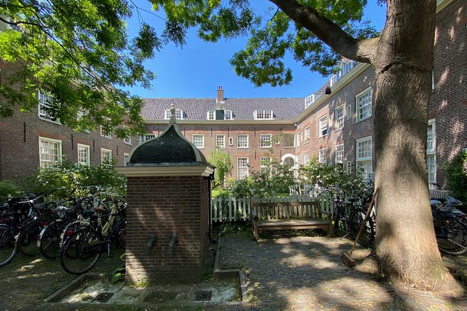 Explore hidden streets with friends - Dam Square, the town hall building, and the why-behind-where