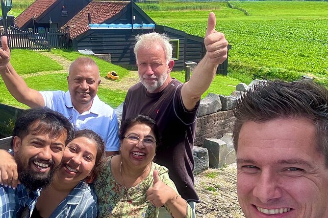 From Amsterdam: Giethoorn Day Trip with Canal & Village Tour - On the Road: The Historical Windmill Stop You Should Not Skip