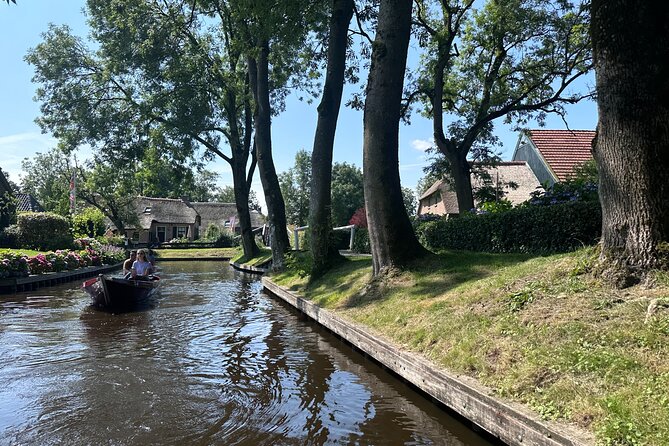 From Amsterdam: Giethoorn Day Trip with Canal & Village Tour - Giethoorn by Boat: How the Canal Cruise Turns the Whole Day