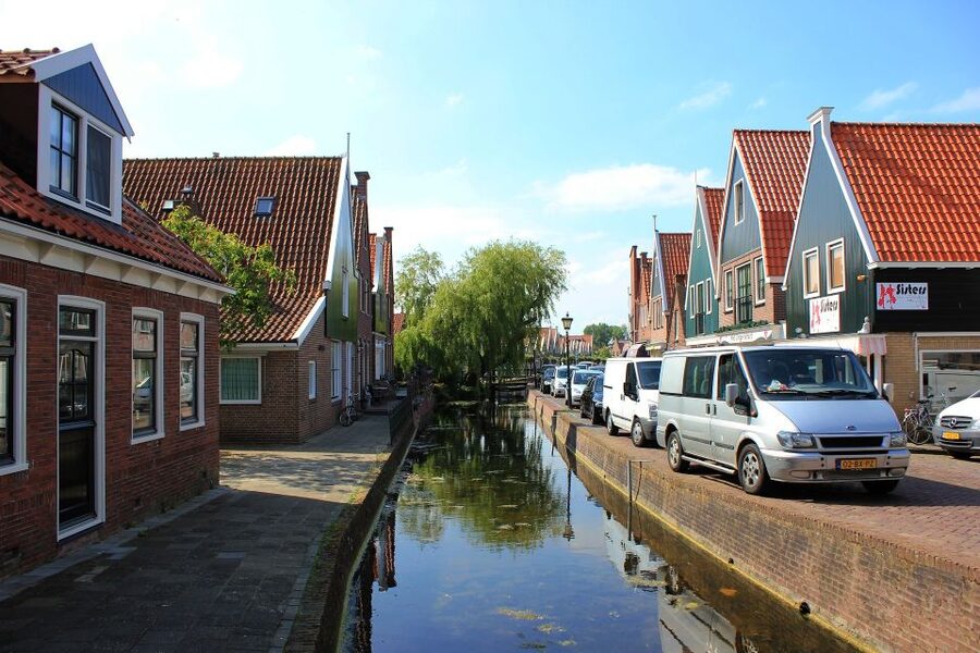 From Amsterdam: Windmills & Volendam Private Tour - Volendam: fish cart, old port ships, and a waterfront walk