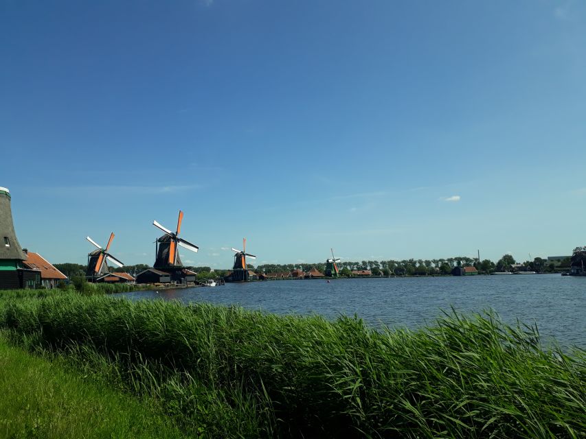 From Amsterdam: Zaanse Schans Windmills Private Tour - Inside the Wooden Village: Windmills, Cheese, and Wooden Shoes