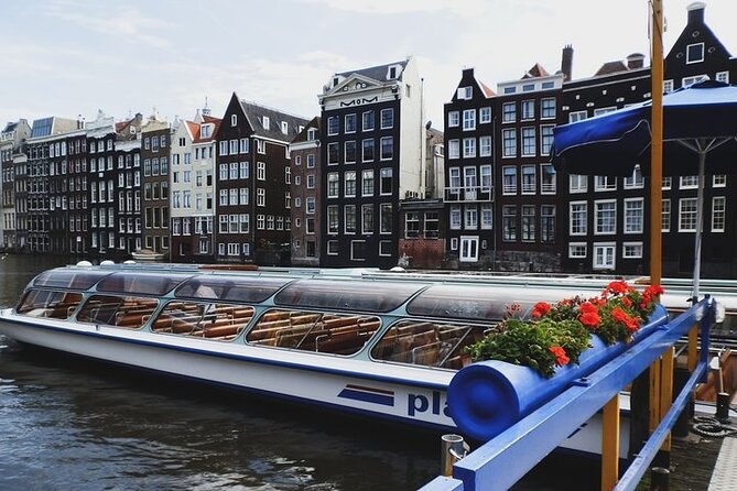 Full-Day Trip From Amsterdam to Keukenhof, Zaanse Schans + Cruise - Zaanse Schans windmill village, the best photo stop with one key add-on