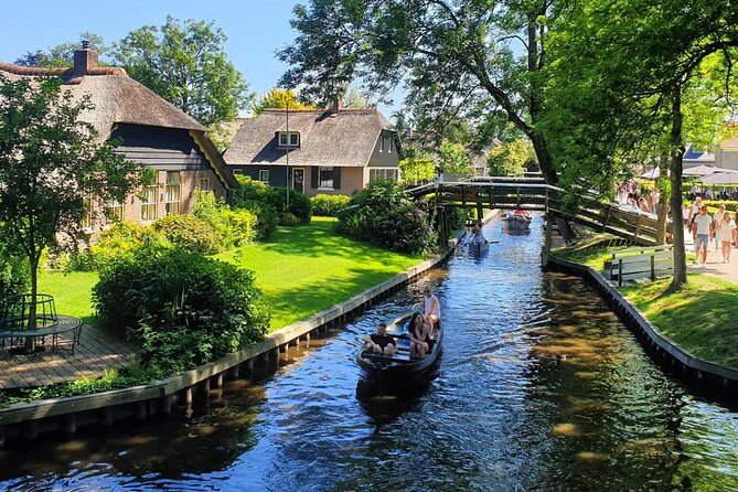 Giethoorn Day Tour from Amsterdam with Small Boat Ride - The Amsterdam to Giethoorn ride, and how the day flows