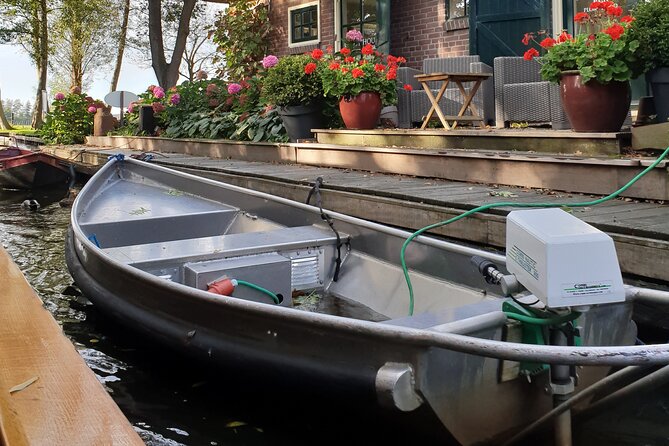 Giethoorn Day Tour from Amsterdam with Small Boat Ride - 1-hour small electric boat ride: duck under bridges, drive your own