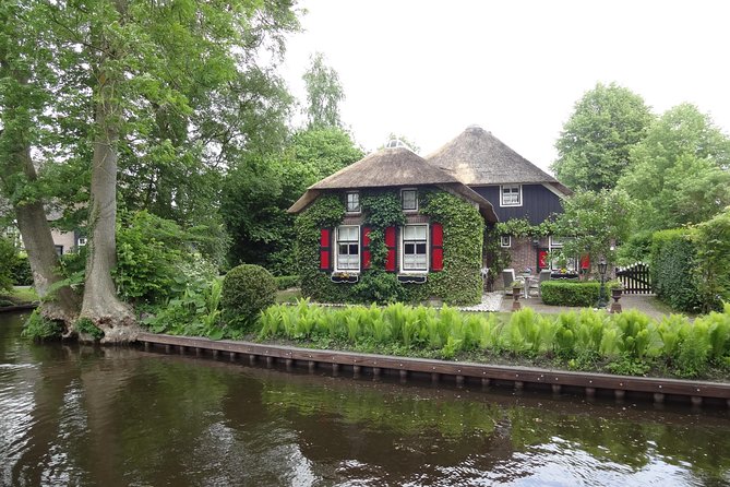 Giethoorn Day Tour from Amsterdam with Small Boat Ride - Price and value: paying for small-group pace and local boat time