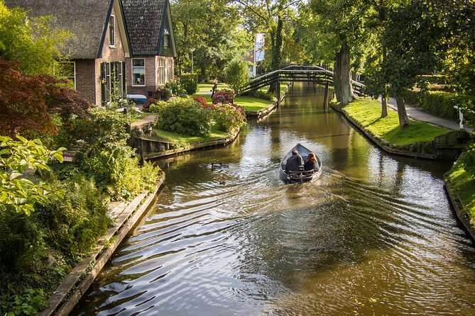 Giethoorn Day Trip from Amsterdam – Private Tour & Canal Boat - The 1-Hour Canal Boat Ride: Linden Trees, Bridges, and Live Stories