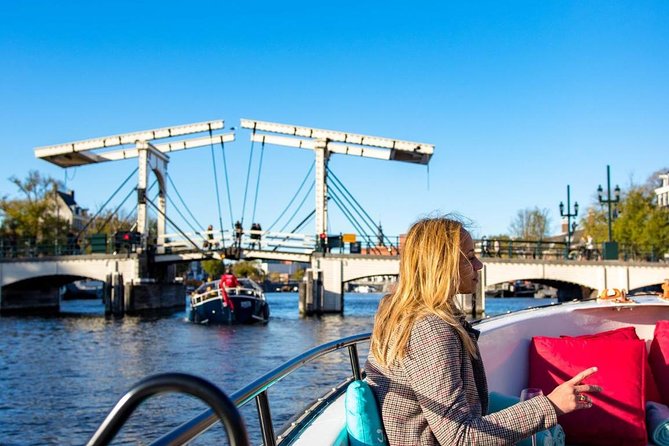 Guided Amsterdam Canal Cruise – Snacks & Drinks on board(1 Hour) - The Route: Hidden Canals, UNESCO Views, and the Oldest Streets