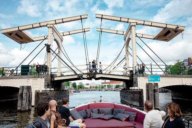 Guided Amsterdam Canal Cruise – Snacks & Drinks on board(1 Hour) - Tour Itinerary: Stop by Stop What You’ll See