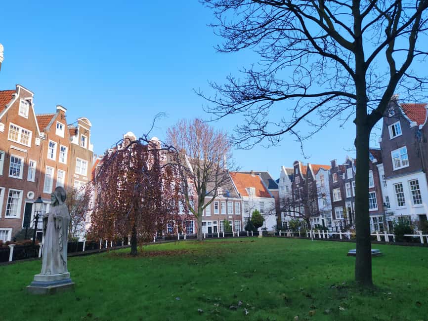 Happy B-day Amsterdam! Guided Tour with a History Buff - Begijnhof and the Flower Market finish, quiet calm to colorful energy