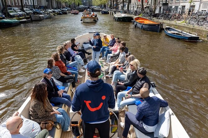 Highlights and Local Insights Canal Cruise Tour in Amsterdam - Under Magere Brug: the ride finishes with a classic Amsterdam postcard