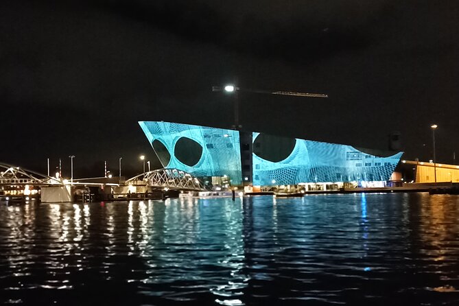 Light Festival Boat Tour max. 10 Guests incl. Gluwhein/Snacks - Stop by stop: UNESCO canals, 20+ light sculptures, and the 1,000-light bridge