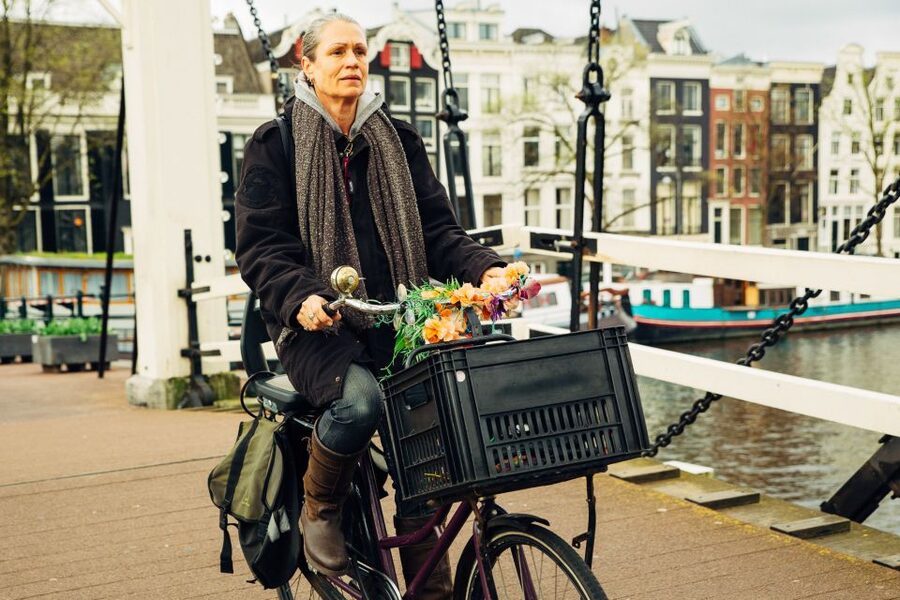 Private Amsterdam Bike Tour with a Local - Private Bike Touring Amsterdams canal life, not just the postcard stops