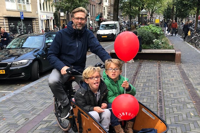 Private Amsterdam Bike Tour with a local guide (also for families) - Stop 1: Anne Frank House from the canal-house outside