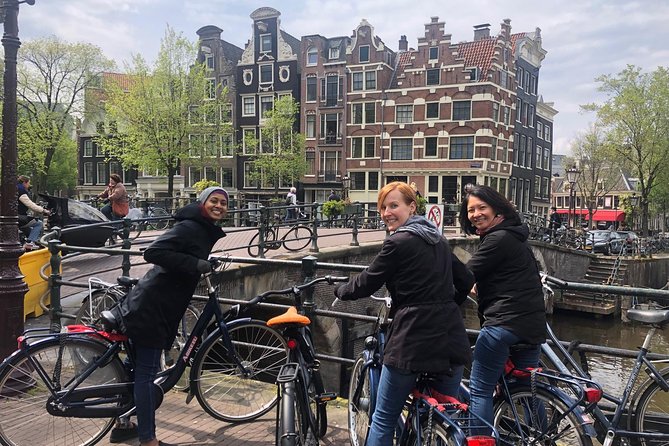 Private Amsterdam Bike Tour with a local guide (also for families) - Stop 2: Dam Square and Damstraat, where Amsterdam’s story begins