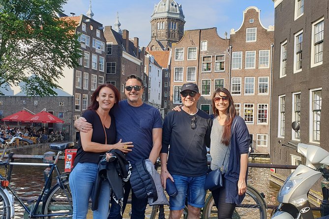 Private Amsterdam Red Light District and Coffee Shop Tour - Pub The Ape: wooden building survival and the 1452 fire lesson