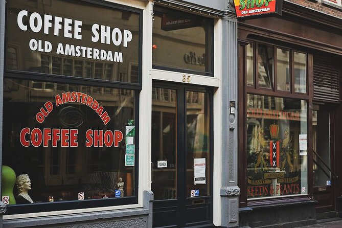 Private Amsterdam Red Light District and Coffee Shop Tour with Expert Guide - Finding De Wallen, passing the red-lit windows, and keeping it respectful