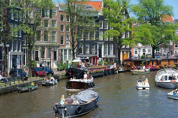 Private Anne Frank tour with canal cruise - Dam Square monument walk and the Royal Palace area