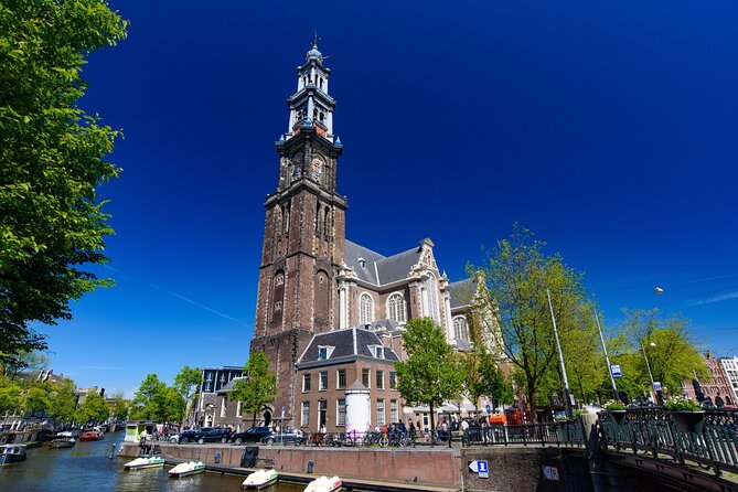 Private Day Tour of Amsterdam's Old Town Highlights by Car - Your licensed guide and language options