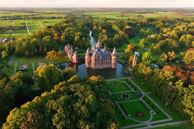 Private day trip from Amsterdam to Utrecht and De Haar Castle - Utrecht in a single hour: Dom Tower, Oudegracht, and Museum Speelklok