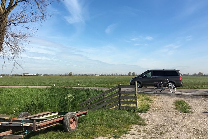 Private daytour from Amsterdam into the Countryside - Volendam Harbor: Fish Bites, Poffertjes, and Old-Port Photos