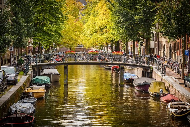 Private departure transfer from Amsterdam to Schiphol Airport (AMS) - Pickup in Amsterdam: choose your spot, then relax