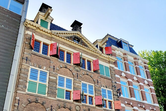 Private Family Walking Tour in Amsterdam - The Jordaan: Houseboats, Water Life, and a Pretty Neighborhood Flow