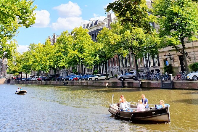 Private Family Walking Tour in Amsterdam - Amstel River Banks and the Endgame Near Anne Frank House