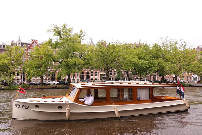 Private Guided Historic Amsterdam Canal Cruise in a Salon Boat - The Amstel River Story: Naming the City from the Water