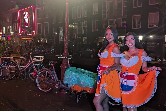 Private Hostess Bar Tour in Amsterdam Red Light District (3h) - De Wallen bar crawl: four bars, free shots, and show energy